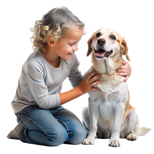 Niño sonriendo abrazando a un perro
